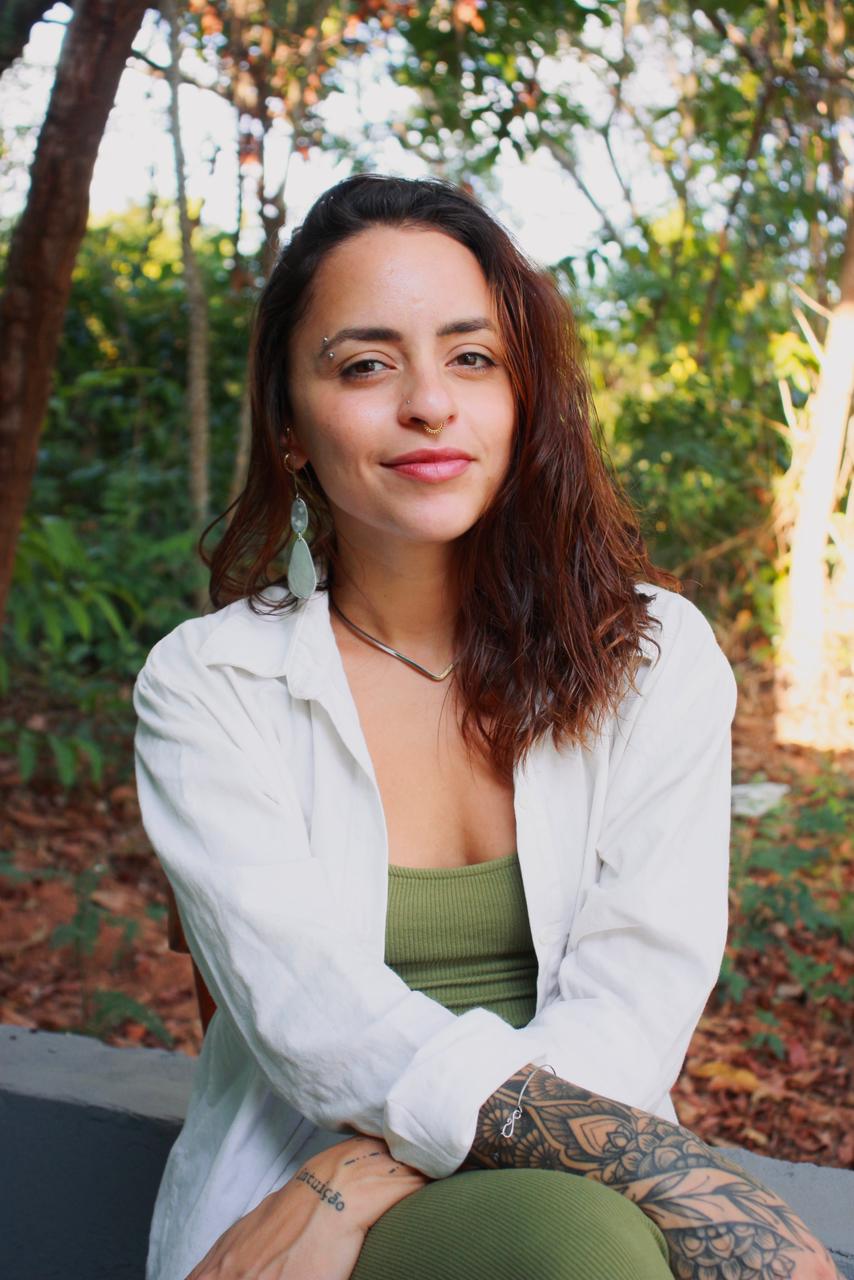 Chris Fenili, idealizadora e fundadora da aúma, psicóloga especialista em desenvolvimento humano